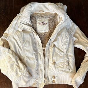 Hollister jacket with hood and removable fur.  Shoulder length 18 inches.